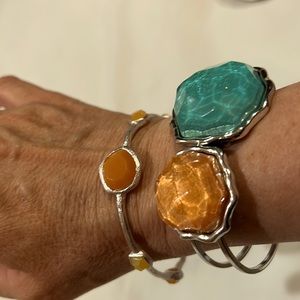 Silver tone bracelets with teal & coral stones